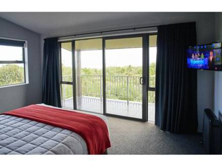 Bedroom in Greymouth Seaview Apartment