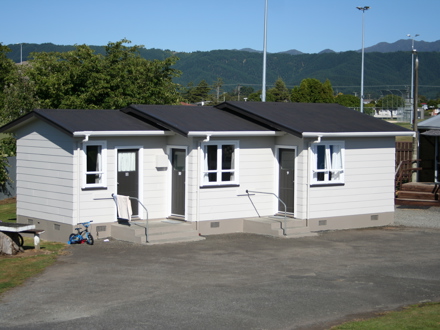 Exterior of basic cabins with toilets