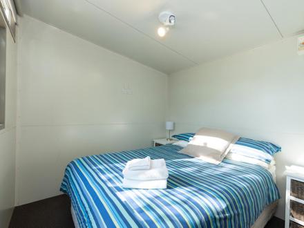 Bedroom in Self Contained Accommodation at Ahipara TOP 10 Holiday Park