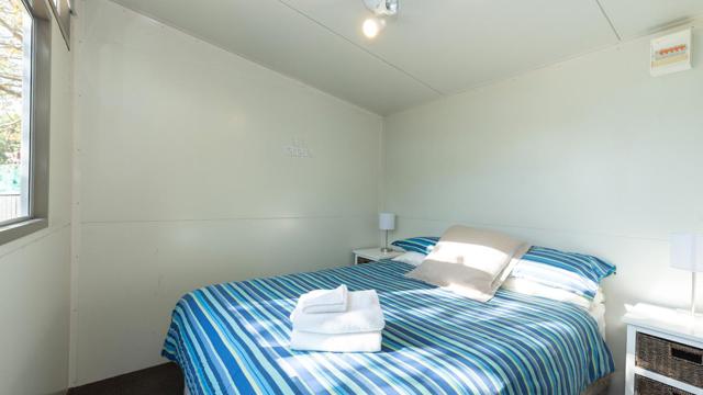 Bedroom in Self Contained Accommodation at Ahipara TOP 10 Holiday Park