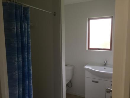 1 Bedroom Park Motel bathroom at Ahipara TOP 10 Holiday Park