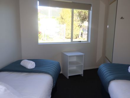 bedroom in motel at Pohara Beach TOP 10