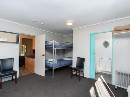 Lodge Bunk Room with ensuite at Ahipara TOP 10 Holiday Park