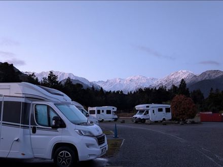 Motorhomes and mountains at Franz Josef TOP 10 Holiday Park