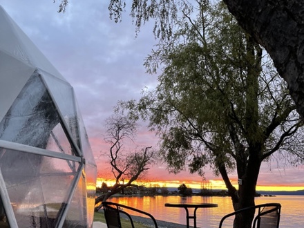 Glamping dome in sunset