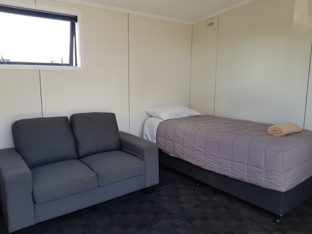 Single bed in standard cabin