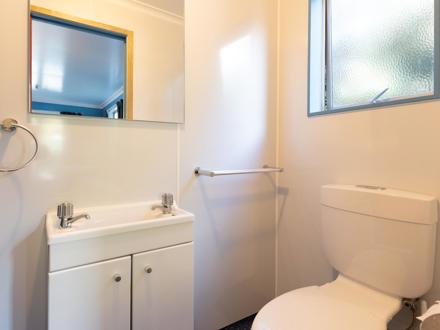 Self Contained Studio bathroom at Ahipara TOP 10 Holiday Park