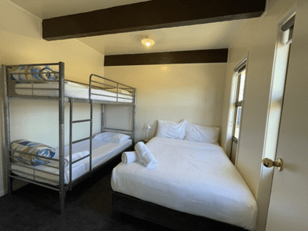 Holiday Park Bedroom with bunk bed and queen bed